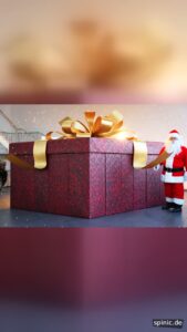 Weihnachtsmann bei der Enthüllung eines Fahrzeugs aus einer Geschenkbox