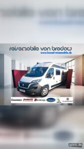 Wohnmobil bei einer digitalen Enthüllung aus einer Geschenkbox